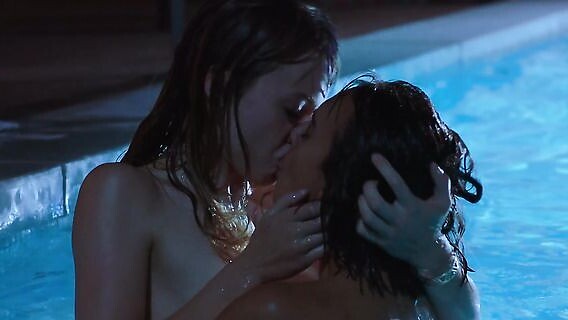 Night sex of two lesbians in the pool 