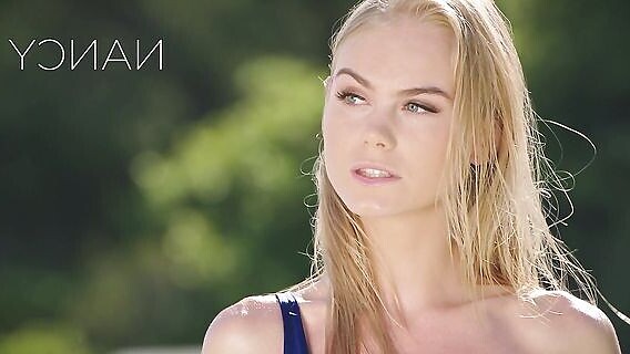 The girl spreads her legs in front of the masseur 
