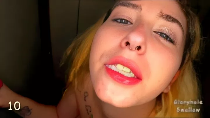 ⁣The girl with the tattoo swallows a lot of sperm and sucks through the hole 